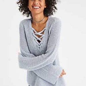 ADORABLE LIGHT BLUE A&E SWEATER WITH TIES IN FRONT